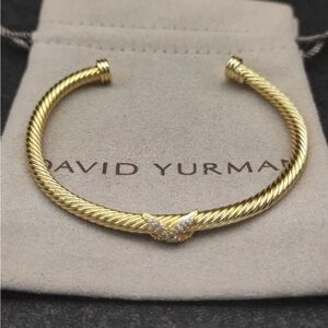 David Yurman's bracelet with a cross motif